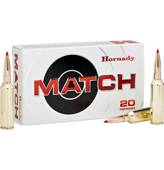 The image features a box of Hornady Match Ammunition, specifically the 6.5 PRC 147 Grain ELD Match rounds, with a quantity of 20 cartridges. The box is predominantly white with black and red accents, highlighting the "MATCH" logo prominently in the center. The visible cartridges display the precision-engineered bullet design known for its exceptional accuracy and performance in long-range shooting. This product is highly regarded among precision shooters for its consistent ballistic performance.