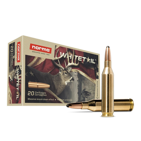 This image shows a box of Norma Whitetail ammunition in .243 Winchester caliber, each round loaded with a 100-grain Pointed Soft Point (PSP) bullet. The packaging prominently features a deer, highlighting the intended use of this ammunition for hunting game such as whitetail deer. The PSP bullet design is favored for its balance between penetration and expansion, making it effective for ensuring quick, humane kills. The .243 Winchester caliber is popular among deer hunters due to its accuracy, manageable recoil, and effectiveness at various ranges. This type of ammunition is designed to deliver high performance for hunters seeking reliability and precision in their shots.