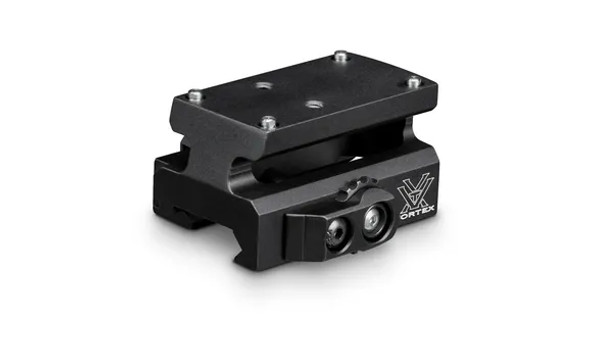 The image shows a mount riser from Vortex Optics, featuring a quick-release (QR) mechanism. Mount risers are used to elevate the mounting platform on firearms, allowing for a more comfortable and ergonomic sight alignment, especially when wearing eye protection or gas masks, or when a shooter needs to align sights with another optical device like night vision. The QR feature indicates that the mount can be quickly attached or detached from a firearm without the need for tools, which is useful for rapid changes in the field or for convenience during transportation and storage.