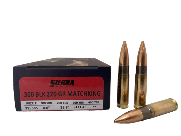 Sierra MatchKing Competition Ammunition for .300 BLACKOUT, 220 grain, featuring the Folds of Honor partnership. The box is dark red and black, with details of the ballistic performance. Two copper-jacketed bullets are displayed in front of the box, highlighting the ammunition's design and commitment to supporting military families.