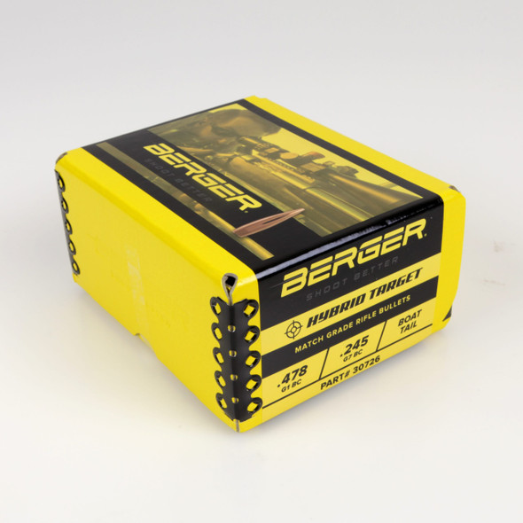 Photograph displaying a prominent yellow box of Berger Bullets, marked as .30 Caliber, 155 grain, with a Hybrid Target design, identified by product number 30726. The sizable box indicates a quantity of 500 bullets, catering to long-range shooters and precision competitors seeking reliable performance and superior accuracy.