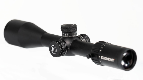 Element Optics Nexus 5-20x50 FFP riflescope. It is equipped with an APR-1C MRAD reticle. This scope offers a magnification range from 5x to 20x, suitable for a variety of shooting distances. The 50mm objective lens diameter is indicative of a broad field of view and strong light-gathering capabilities, beneficial for clear visibility under different lighting conditions. The "FFP" indicates that the scope uses a First Focal Plane design, where the reticle scales in size as the magnification is adjusted, ensuring that the MRAD (milliradian) measurements are consistent for accurate range estimation and bullet drop compensation at all zoom levels. The scope's build suggests robustness, with large, clearly marked adjustment turrets for precise changes in elevation and windage, and potentially a side-focus knob for parallax adjustment.