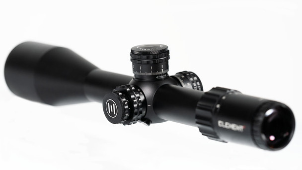 Element Optics Titan 5-25x56 FFP riflescope, which is equipped with an APR-1D MRAD reticle. The scope features a magnification range of 5x to 25x, suitable for long-range shooting, and a 56mm objective lens for excellent light gathering capability. The FFP (First Focal Plane) designation implies that the reticle size scales in proportion to the zoom level, ensuring the MRAD (milliradian) measurements remain consistent across the magnification range for accurate ranging and ballistic corrections. The design of the scope, with its large, tactile turrets and matte black finish, suggests a premium quality optic built for precision and durability.