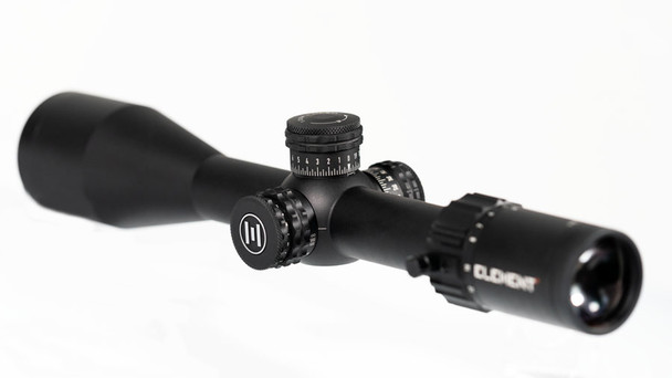 Element Optics Nexus 5-20x50 FFP riflescope. It features the EHR-1C MOA reticle, designed for precision shooting. The riflescope is equipped with a magnification range of 5-20x and a 50mm objective lens, indicated by the text on the body. The large turret in the center top likely adjusts elevation, while the turret on the side is typically for parallax adjustment, allowing the shooter to focus at various ranges. The First Focal Plane (FFP) designation means that the reticle size changes in proportion to the zoom level, which is advantageous for accurate ranging and holdovers at different magnifications. The overall design and construction of the Nexus suggest it's built for durability and reliability under various shooting conditions.