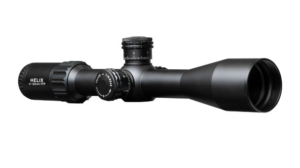 Element Optics Helix 4-16x44 FFP scope, equipped with an APR-2D MRAD reticle. It's a different model from the Theos previously mentioned, offering a more moderate range of magnification suitable for a variety of shooting distances. The First Focal Plane (FFP) designation means that the size of the reticle scales with the magnification, maintaining the same visual proportion to the target across the zoom range, which is helpful for range estimation and holdovers. The APR-2D MRAD reticle will aid in making precise adjustments for bullet drop and windage. This model is typically favored by those seeking a versatile, high-performance scope for both medium and long-range shooting.