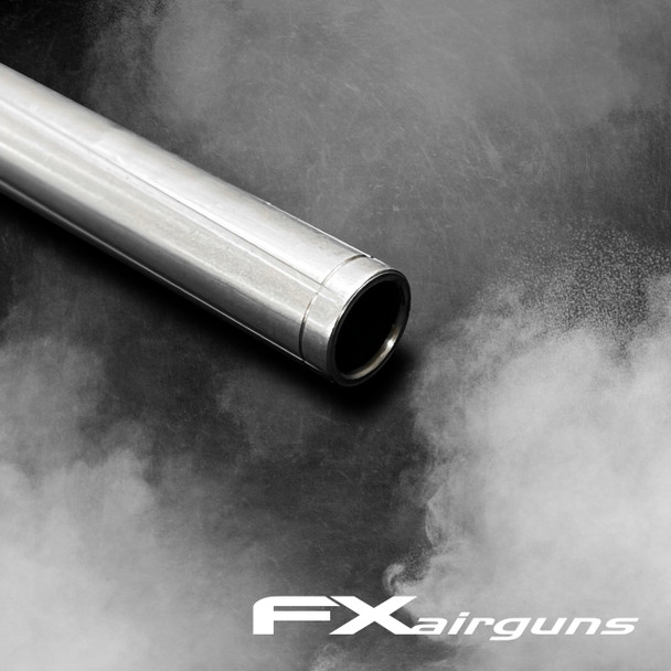 Close-up image of the FX Airguns Superior STX Heavy Liner in .25 caliber, 700mm long, model FX20659S. This barrel liner is shown against a smoky gray background, highlighting its smooth metallic finish and precision-engineered bore for enhanced accuracy. Ideal for upgrading FX Airguns for superior shooting performance.