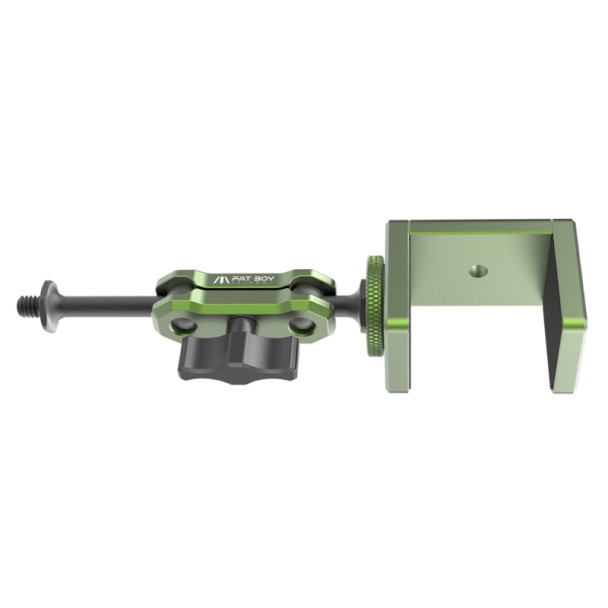The FatBoy 'Side Chick' support bracket system, featuring a green metallic structure with a black adjustment mechanism. The design includes a side clamp for attaching to a rifle or other equipment and a lengthy adjustable screw for precise positioning. This tool aids in enhancing stability and accuracy during use, displayed against a white background, highlighting its sleek and functional design.