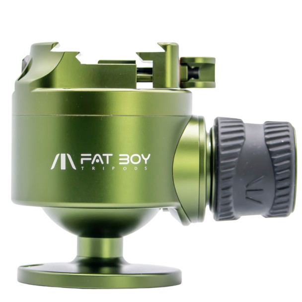 The FatBoy 'Invert60' ball head in a striking green color, featuring a robust, spherical design with a large, gray grip knob for adjusting the ball tension. The ball head is engineered for smooth movements and precise control of camera angles. The prominent FatBoy logo is engraved on the side, indicating the brand's commitment to quality. The image presents the ball head against a light background, emphasizing its solid build and professional appearance.