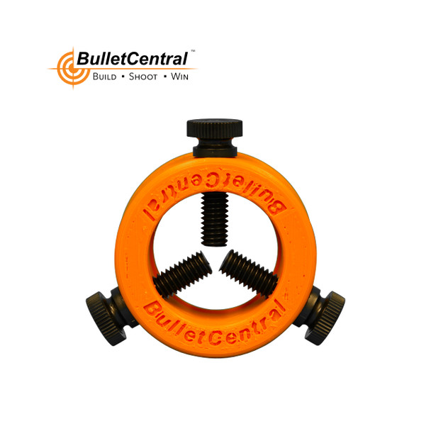 Whiskey Creek Precision Bottle Buddies in vibrant orange. This unique tool features a circular design with threaded sections for holding multiple bottles securely in place. It includes the embossed Whiskey Creek logo and 'BulletCentral' text, showcasing its utility and brand identity for outdoor enthusiasts and competitors.