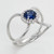 14KT White Gold  Halo Diamond and Oval Sapphire Ring  0.25 CTW