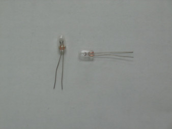 One Base / Mobile Meter Lamp without Orange covers  DX2527 RCI 2950 / 2970 Ect. Normally these come with a orange cover but those are no longer available so you will have to reused your old cover. Notice that there are two lamps in the picture but the price is for one each.