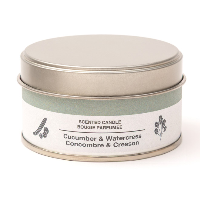 Bougie au parfum concombre et cresson dans une boîte en étain
