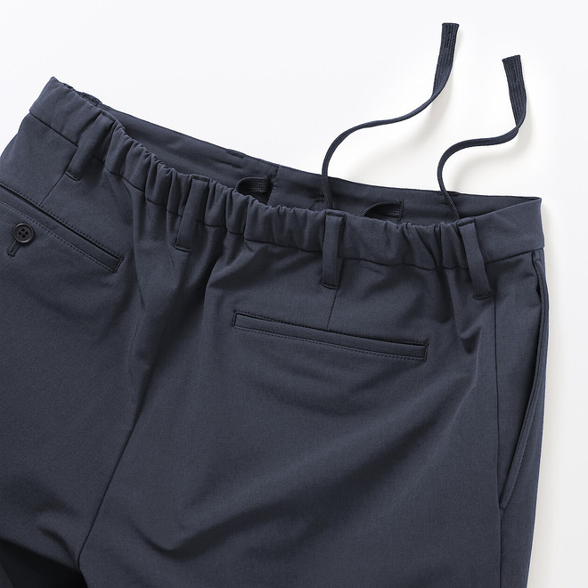 Pantalon à jambes fuselées extensible, coupe‐vent et doublé polaire, pour homme