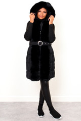 Gianna Hooded Faux Fur padded Longline Gilet in black from the back