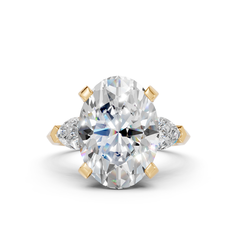 Oval & Pear Three-Stone Ring (6.18 cttw)