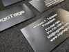 Black Aluminum Business Cards with laser engraved design on both sides. 