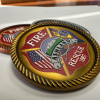 The raised UV gives your art depth, brings the details of the image to life & allows you to feel the raised and recessed portions of the printing giving the coin a premium feel