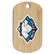 Custom bamboo dog tag with sugar bowl skiing logo on it and it is oriented vertically