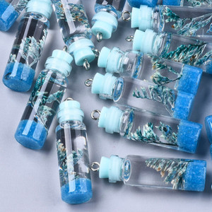 Blue Glass Bottle Charm with Resin & Dried Flowers Blue Glass Bottle Charm with Resin & Dried Flowers