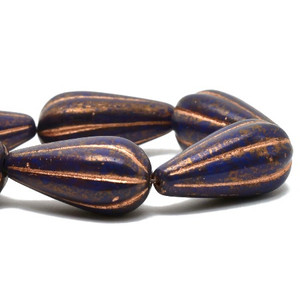 11x22mm Melon Drop Indigo with Gold Finish and Copper Wash Czech Glass Bead Strand 11x22mm Melon Drop Indigo with Gold Finish and Copper Wash Czech Glass Bead Strand