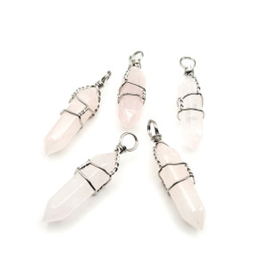Double Terminated Pointed Wire Wrapped Rose Quartz Faceted Bullet Pendant Double Terminated Pointed Wire Wrapped Rose Quartz Faceted Bullet Pendant
