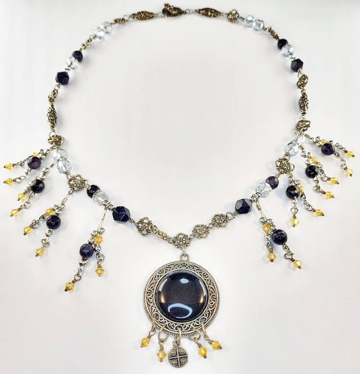 Celestial Nightfall Necklace – Blue Stone and Crystal Fringe Design