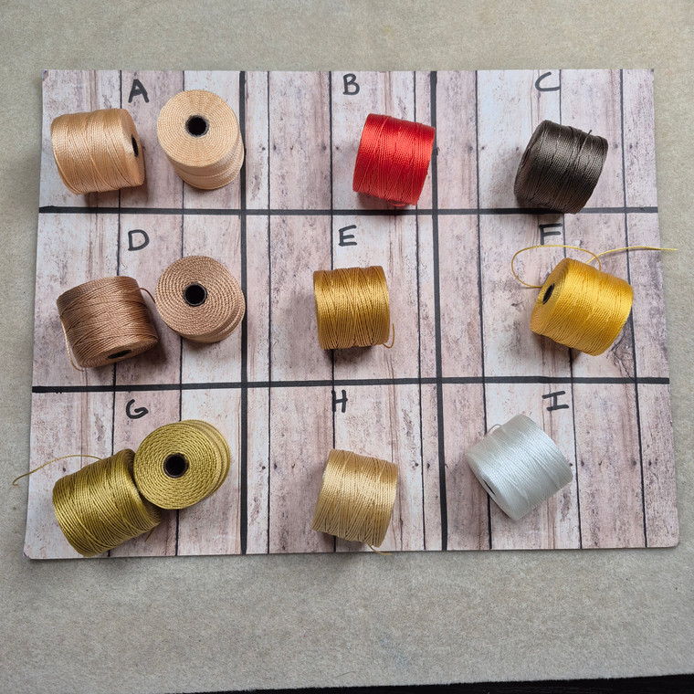Assorted C-Lon Bead Cord – .5mm, 77 Yard Spool, Yellows & Neutrals, Sold Individually