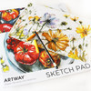 Artway Sketch Pad in use — floral pastel and pencil study beside a 2B pencil and soft pastels