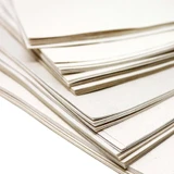 Fanned stack of Artway Tree Free Hemp Paper A4 showing the natural-coloured sheet edges