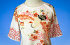 Traditional Vietnamese ao dai with print of crane and floral blossoms