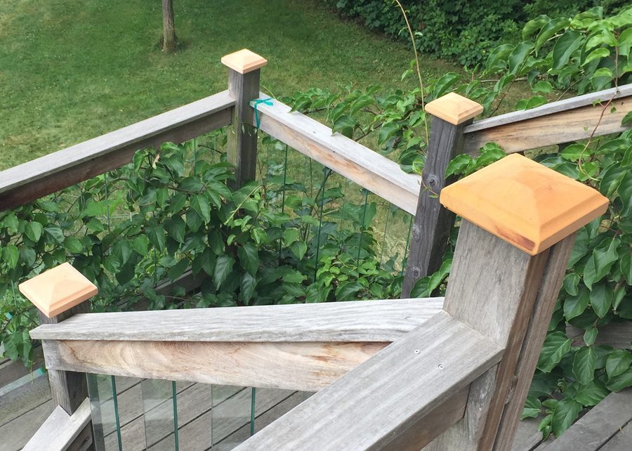 4x4 Traditional Pyramid Miterless wood post caps on a deck railing