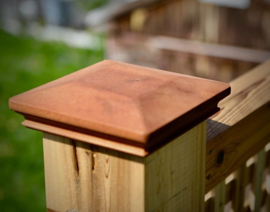 One-piece Pyramid Miterless wood post cap on a 4x4 fence post