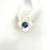 Large 4 Petal Mother of Pearl with Blue Sapphire Flower Earrings