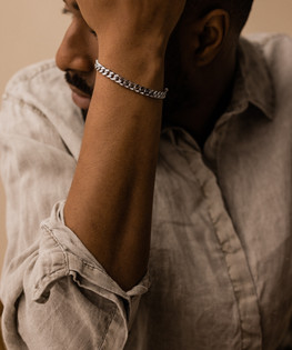 Grand Curb Link Bracelet in Silver on male model