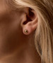 Model Wearing Hypoallergenic Golden Titanium 6mm Half Ball Earrings