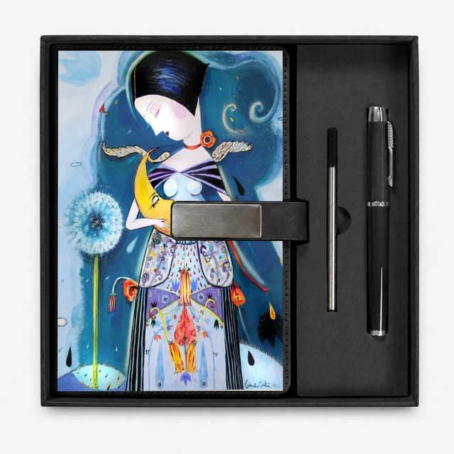 Girl holding the moon journal & pen set