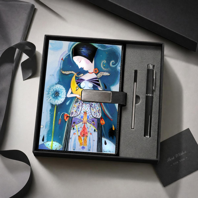 Girl holding the moon journal & pen set