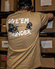 Rear view of a person wearing the EGW Give'Em Thunder Turkey T-shirt in the field, showing the back graphic during outdoor use.