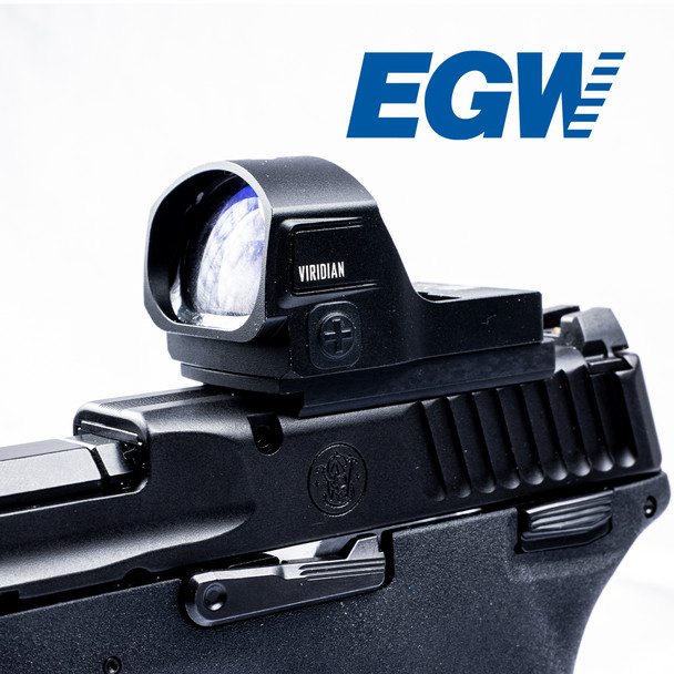 Close-up view of the Red Dot Adapter Plate securely mounted on the slide of a Smith & Wesson M&P .22 Magnum/5.7 pistol, with a red dot optic installed. The image highlights the precise fit and solid construction of the mount, showing clean alignment between the optic and the firearm slide for reliable target acquisition.