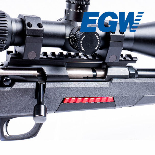Close-up rear 3/4 view of the EGW 20 MOA Picatinny rail installed on a Winchester Xpert Magnum with EGW scope rings and a mounted riflescope.