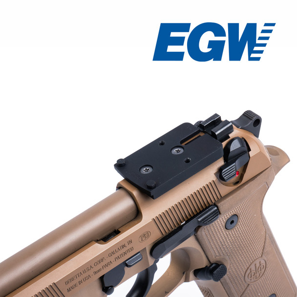 Left front 3/4 view of the EGW Trijicon RMR / SRO and Holosun 407C / 507C adapter plate installed on a Beretta 92 RDO slide.