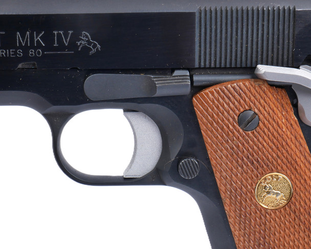 Right-side view of the 1911 Solid Prism Trigger – Medium installed in a 1911 pistol, showing the trigger fit within the frame.