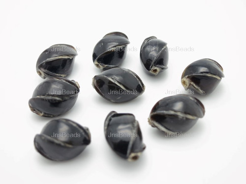 10X15mm Buffalo Horn Twistedf Beads 9pcs.