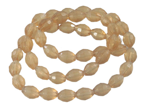 6x8mm Topaz Faceted Rice Beads 15.5" synthetic [sc7a7]