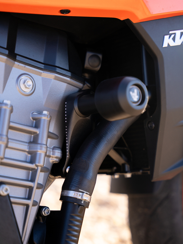 Close up of a crash-bobbins of an orange and black KTM 990 DUKE stunt motorcycle. 