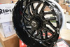 Close-up of TIS 544BM wheel finish and spoke details for custom truck builds