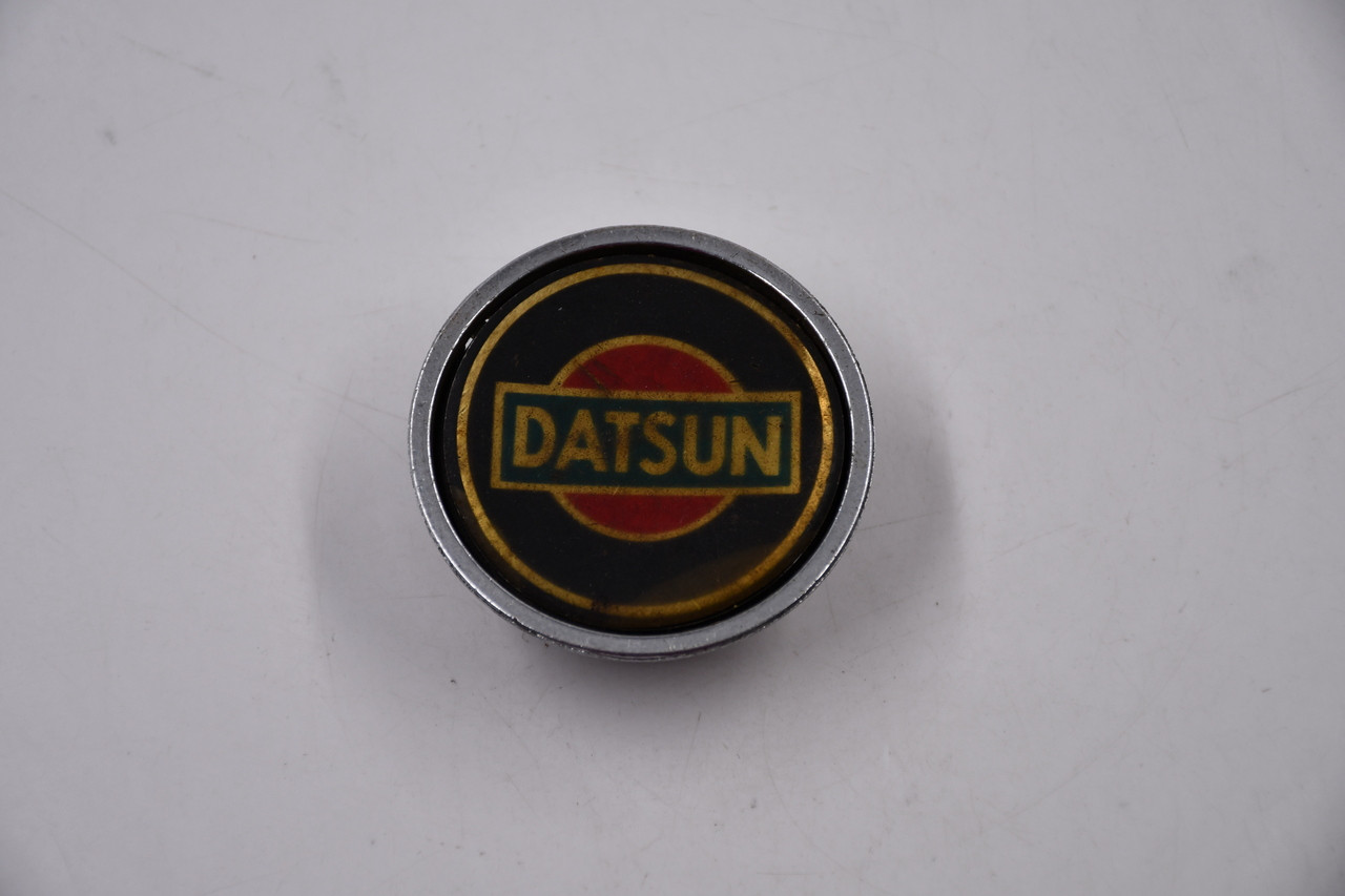 Datsun Aluminum w/ Red, Blue, Gold, Black Logo Wheel Center Cap Hub Cap 254842(DATSUN) 2.3125"