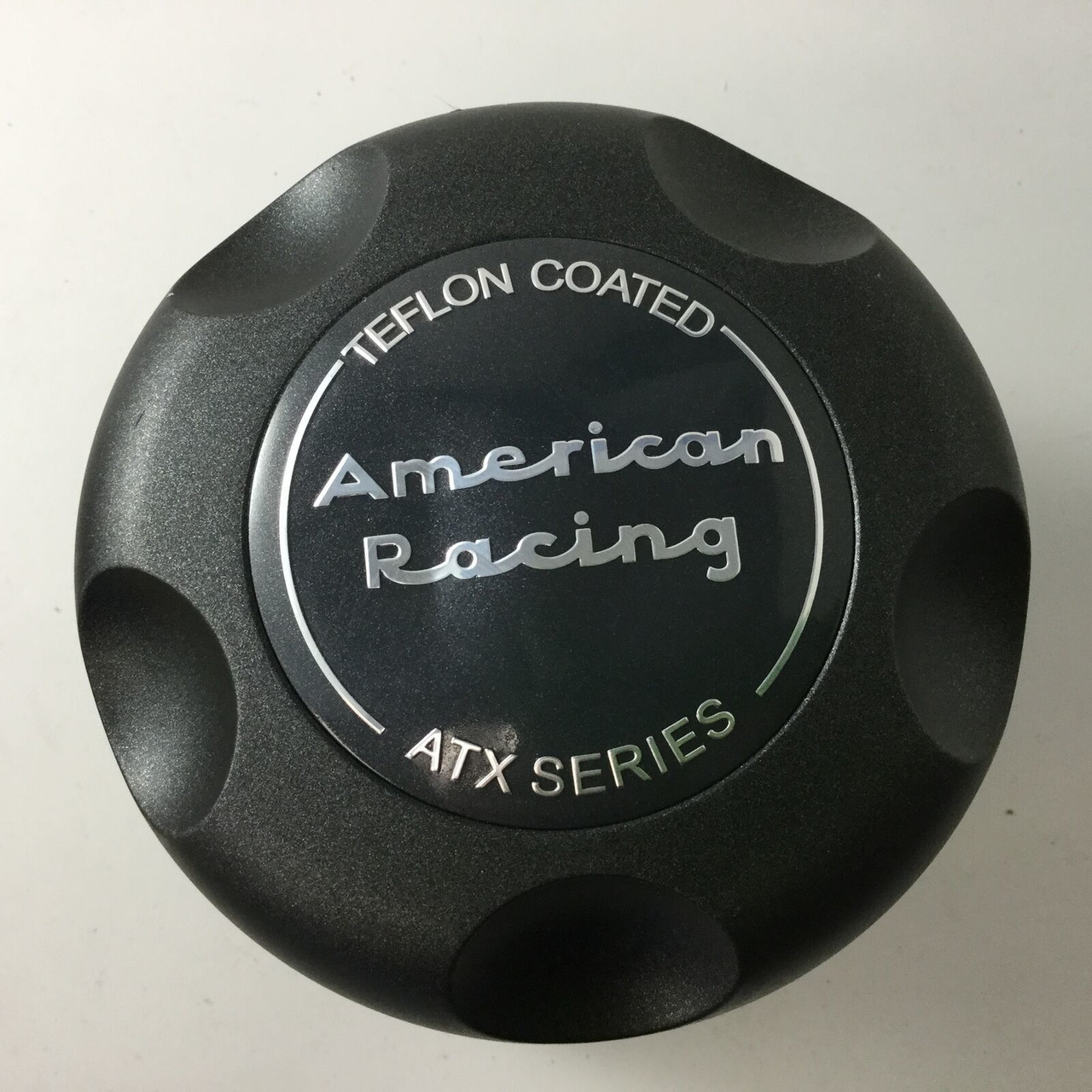 American Racing 1515006022 black ATX center cap front view