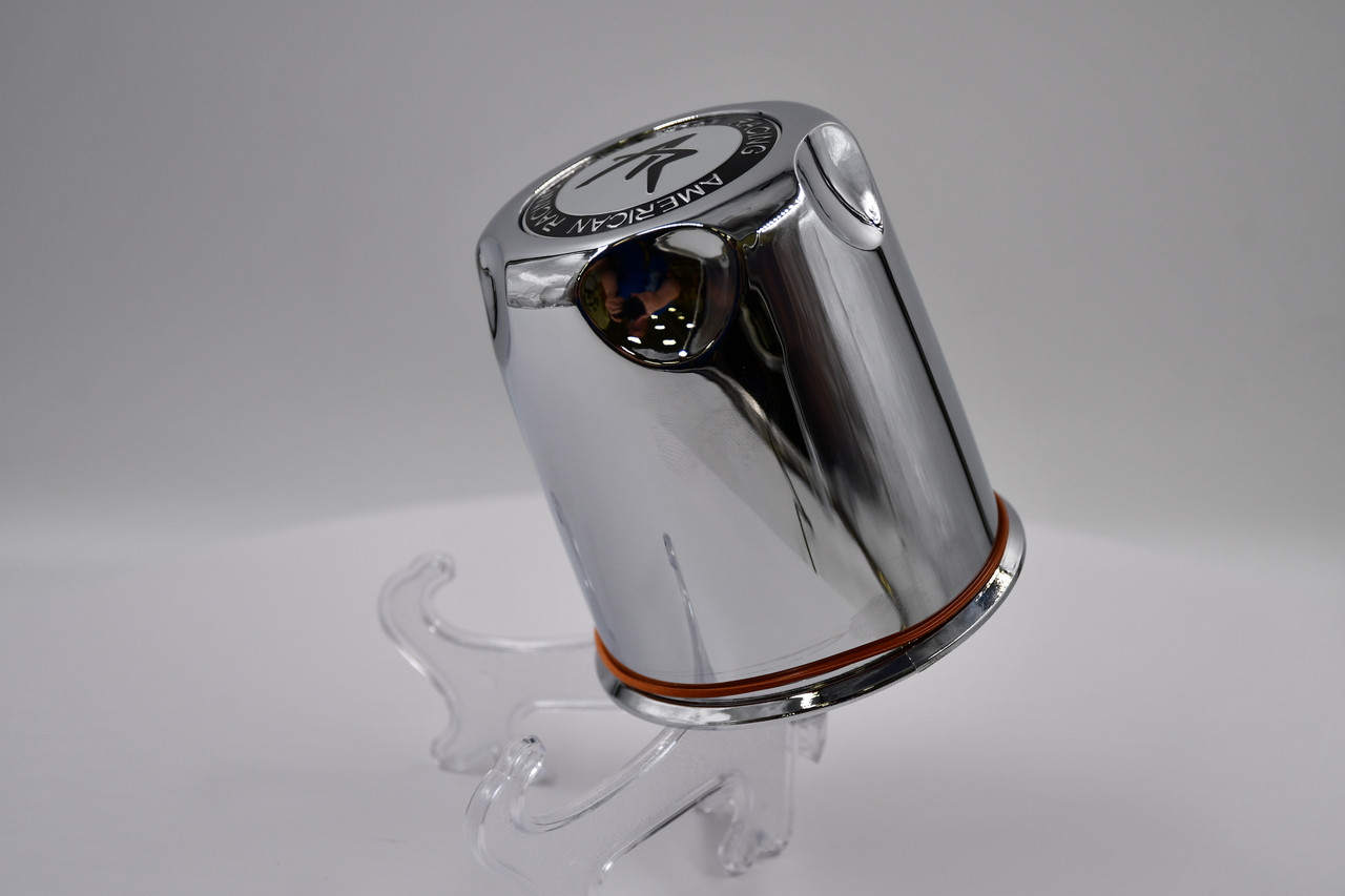 Genuine American Racing 1327000S chrome push thru center cap featuring the iconic AR logo, 3.27 inch outside diameter, and tall dome design for select American Racing wheel applications.