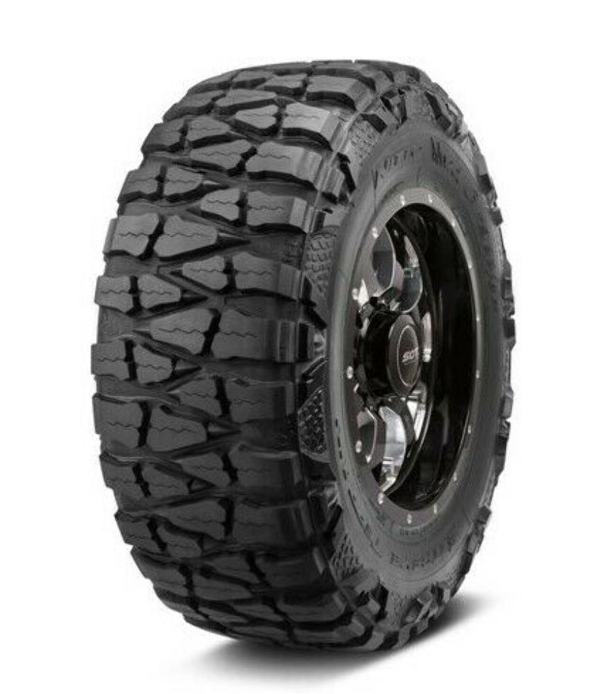 Nitto Mud Grappler extreme mud-terrain tire featuring an aggressive tread design for trucks, SUVs and off-road builds, available at A2i Wheel & Tire.
